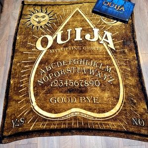 Ouija board and fuzzy blankie